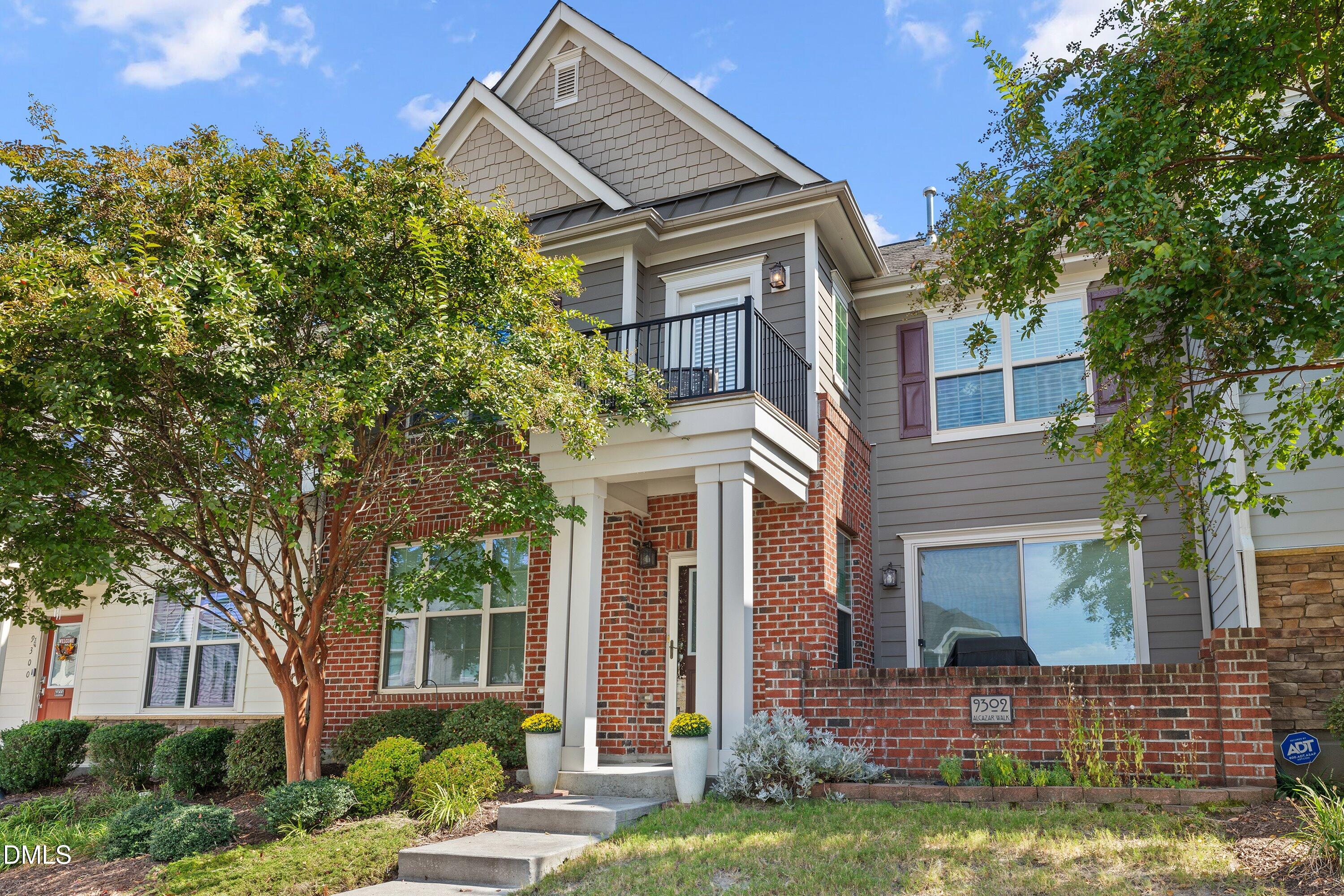 9302 Alcazar Walk Raleigh, NC 27617 - Photo 2 of 40 front view of a house with a yard