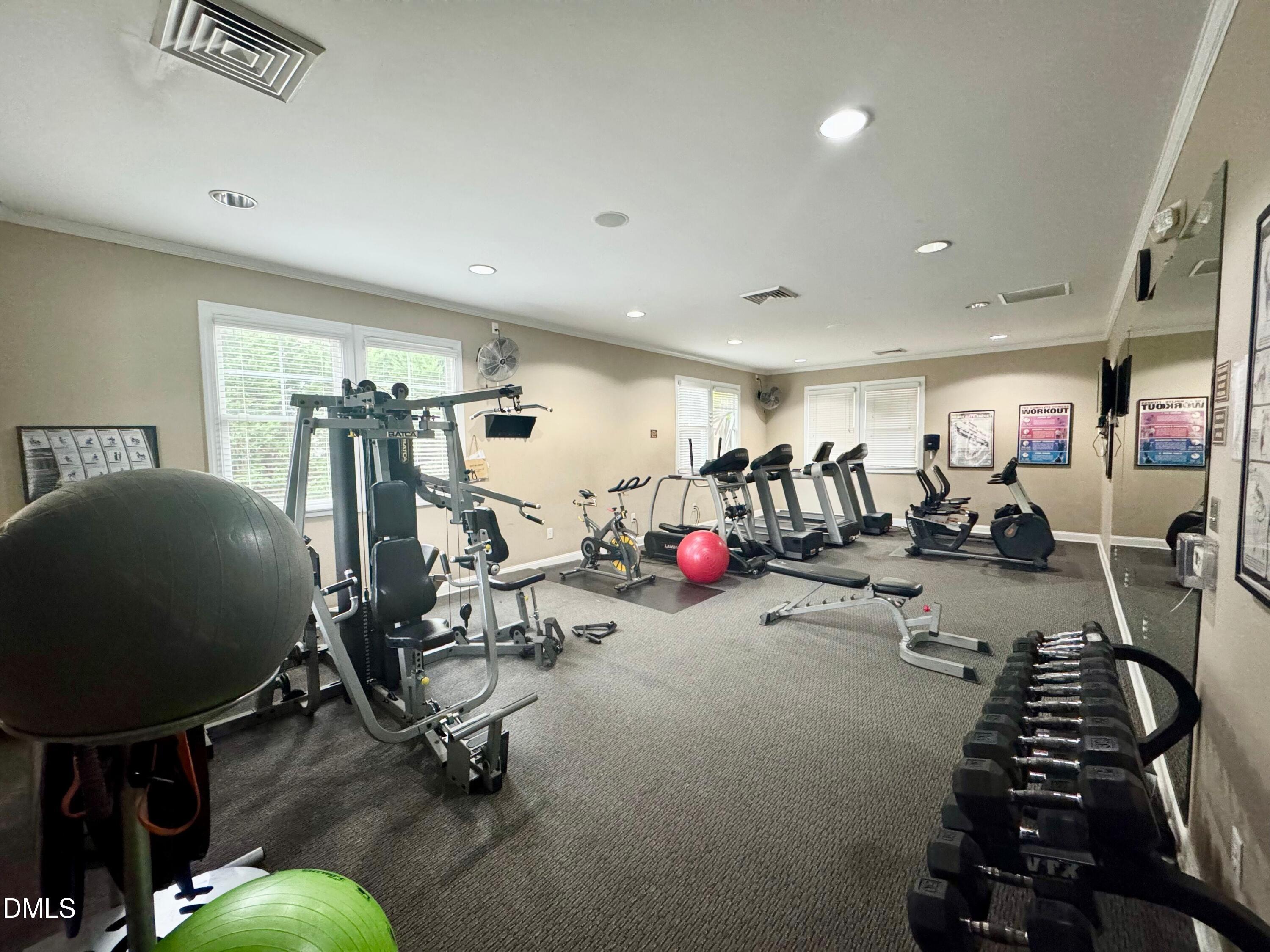 9302 Alcazar Walk Raleigh, NC 27617 - Photo 36 of 40 a view of a room with gym equipment