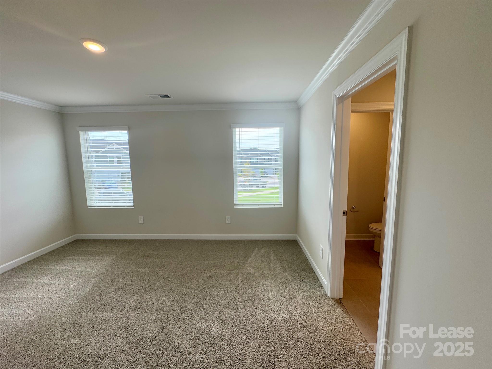 1650 Vlg Grv Lane Monroe, NC 28110 - Photo 19 of 23 an empty room with windows