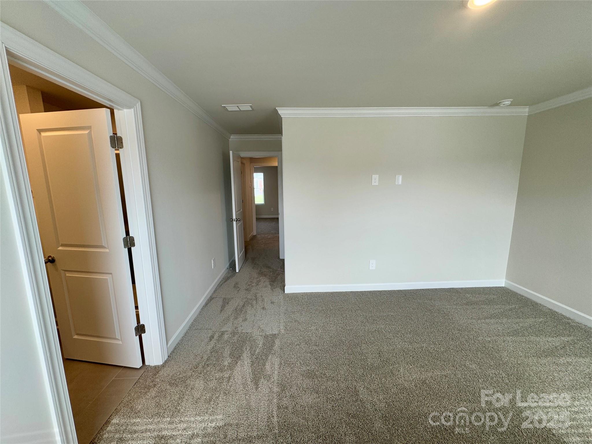 1650 Vlg Grv Lane Monroe, NC 28110 - Photo 21 of 23 an empty room with windows