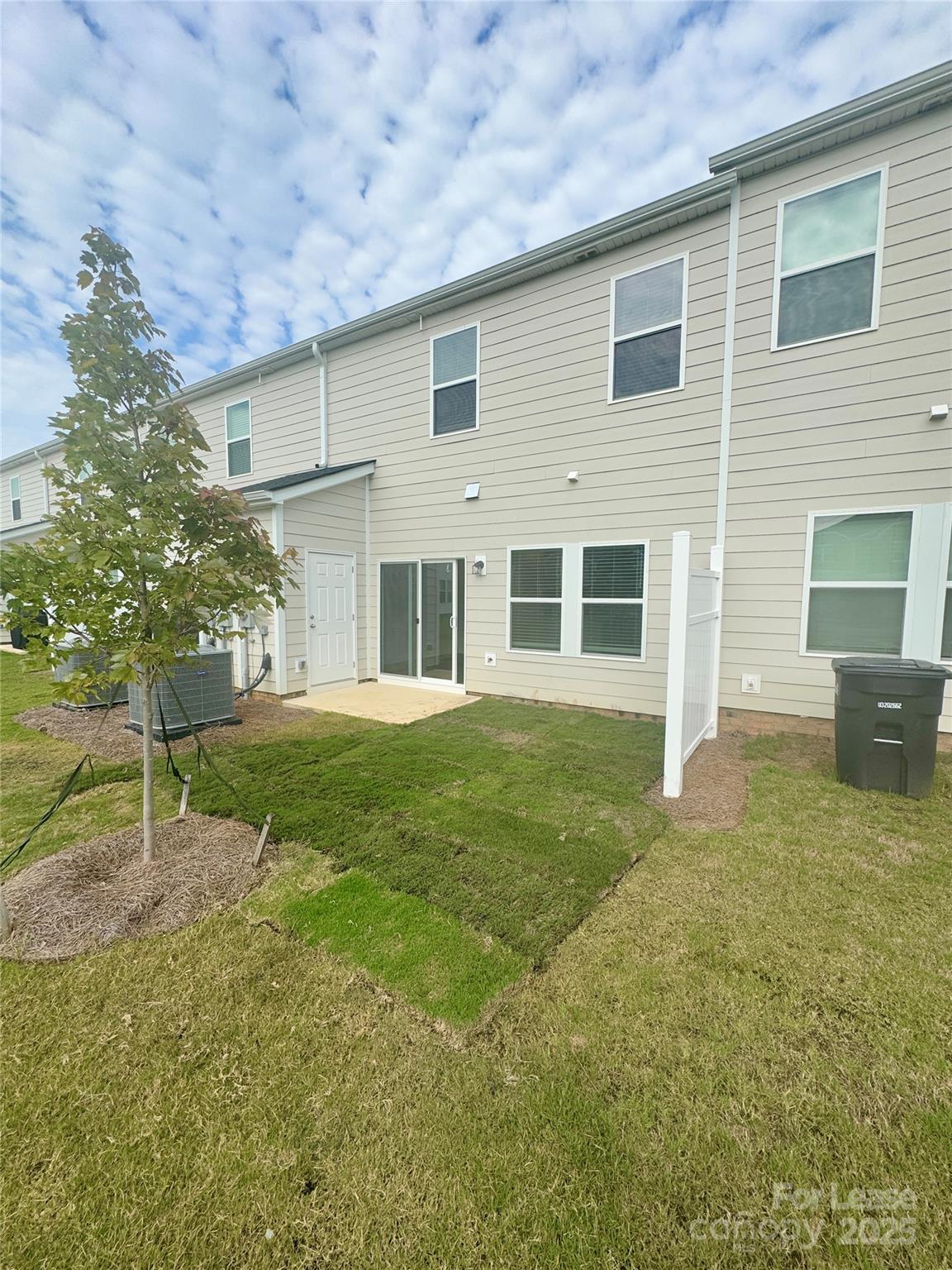 1650 Vlg Grv Lane Monroe, NC 28110 - Photo 3 of 23 a backyard of a house with seating space