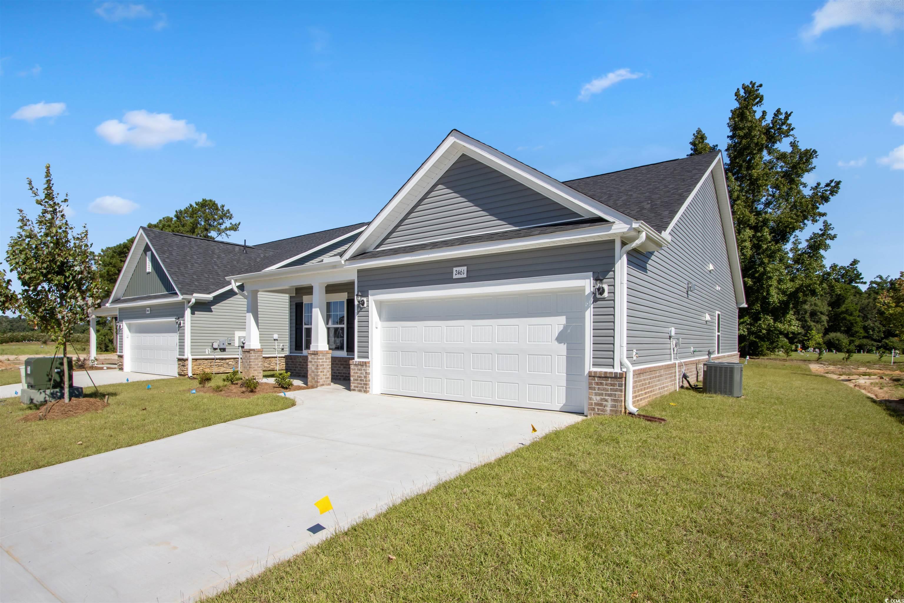2461 Campton Loop Conway, SC 29527 - Photo 30 of 33 Craftsman-style house featuring a garage, central