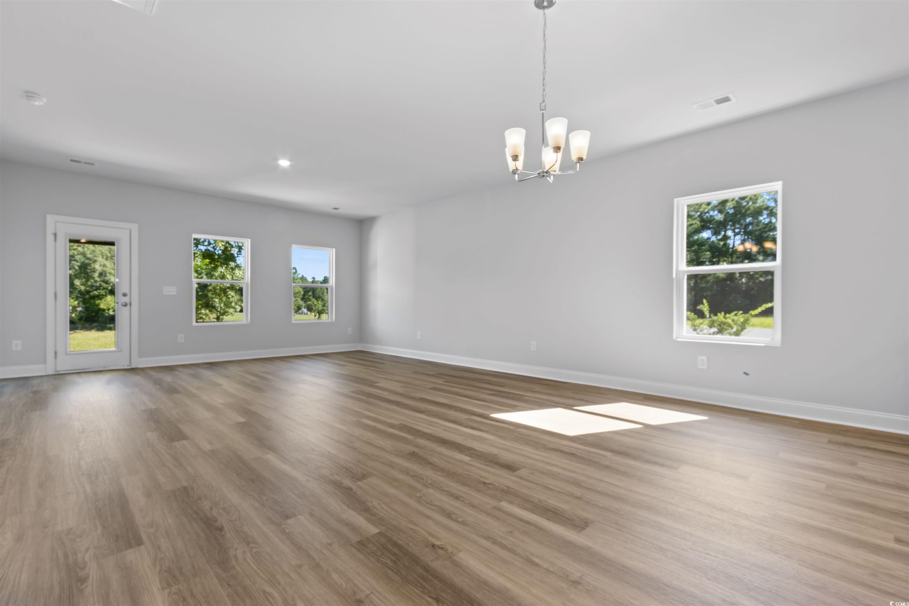 2461 Campton Loop Conway, SC 29527 - Photo 9 of 33 Unfurnished room with light wood-type flooring and