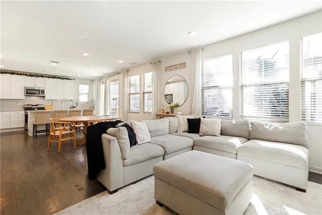 a kitchen with a sink cabinets and window