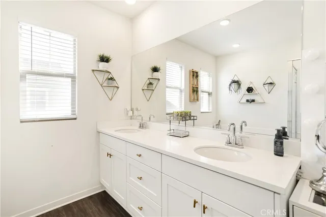a bathroom with a bathtub and a window
