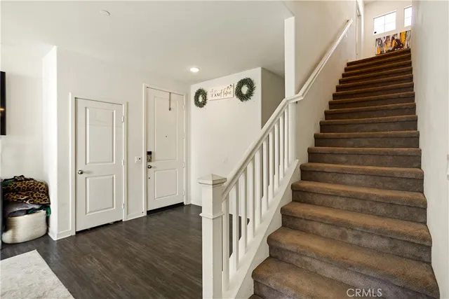 a living room with furniture fireplace and a flat screen tv