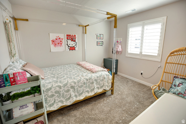 983 South 950 West Provo, UT 84601 - Photo 44 of 56 Carpeted room featuring a window with white plantation shutters and a built-in shelf