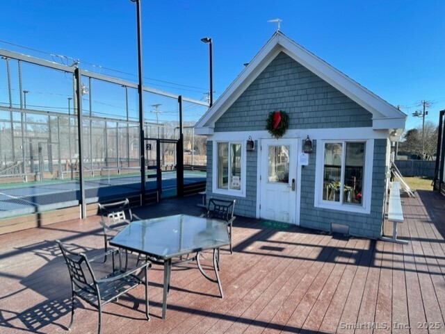 49 Trumbull Avenue Stonington, CT 06378 - Photo 12 of 14 a backyard of a house with seating space