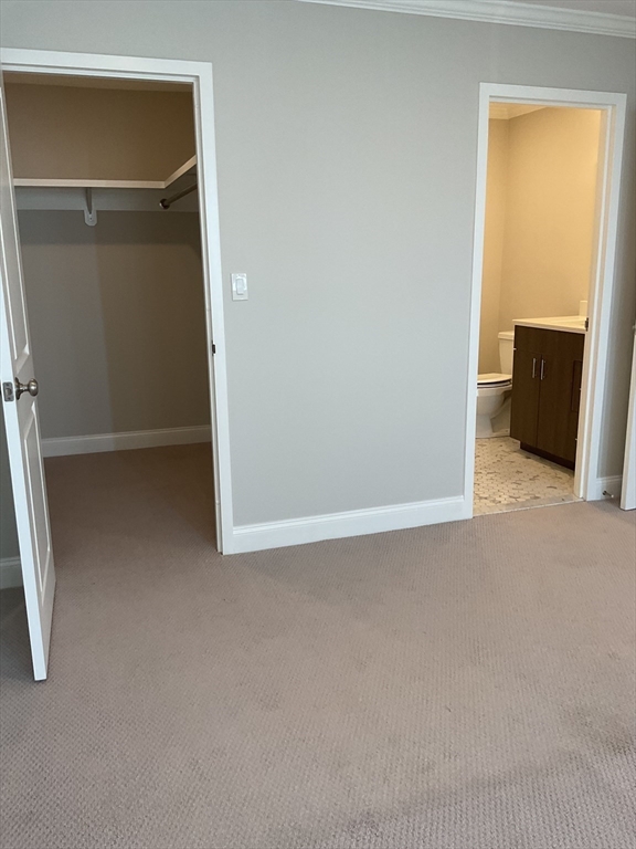 1006 Paradise Road, Unit PH Q Swampscott, MA 01907 - Photo 9 of 16 an empty room with closet