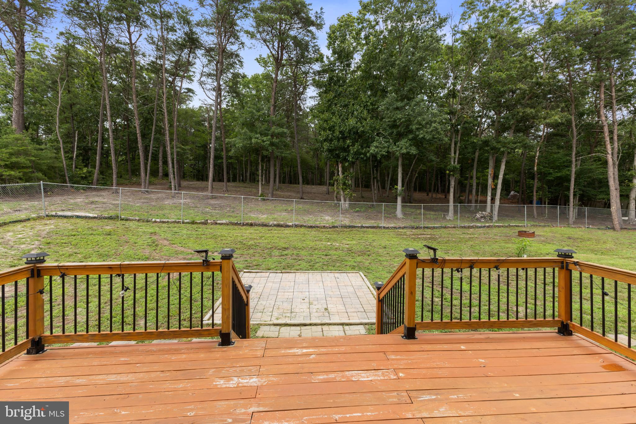 239 Shaws Mill Road Cedarville, NJ 08311 - Photo 28 of 39 Serene backyard retreat with lush greenery.