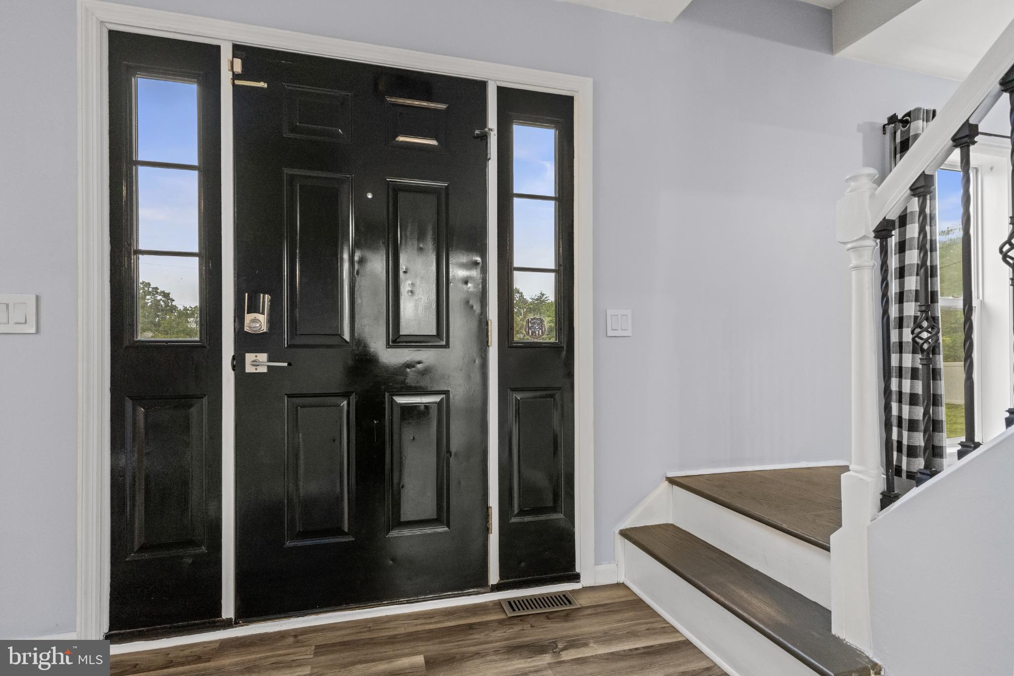 239 Shaws Mill Road Cedarville, NJ 08311 - Photo 3 of 39 Elegant entryway with striking black doors.