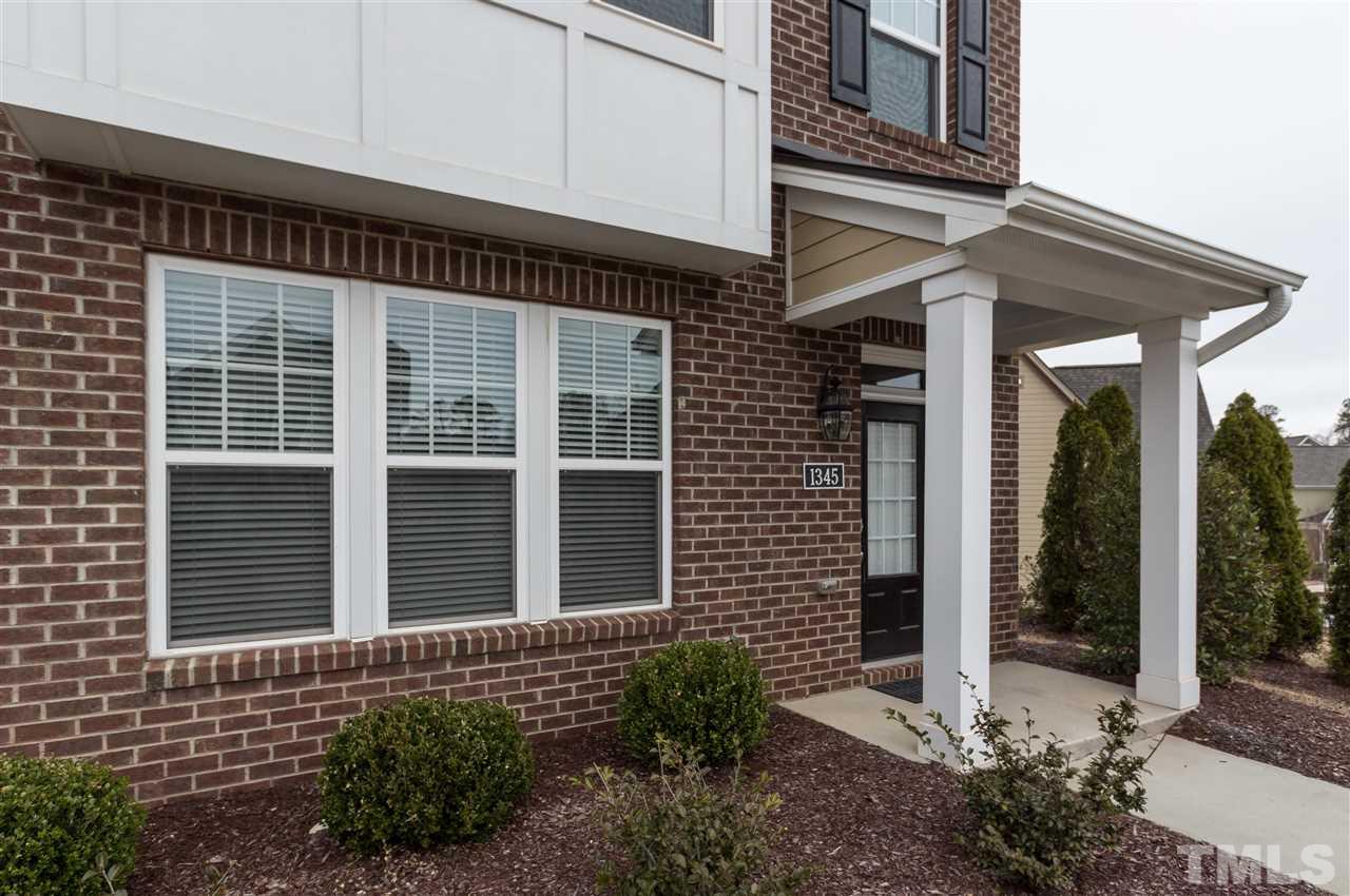 1345 Rodessa Run Raleigh, NC 27607 - Photo 2 of 24 a view of a house with entryway and plants