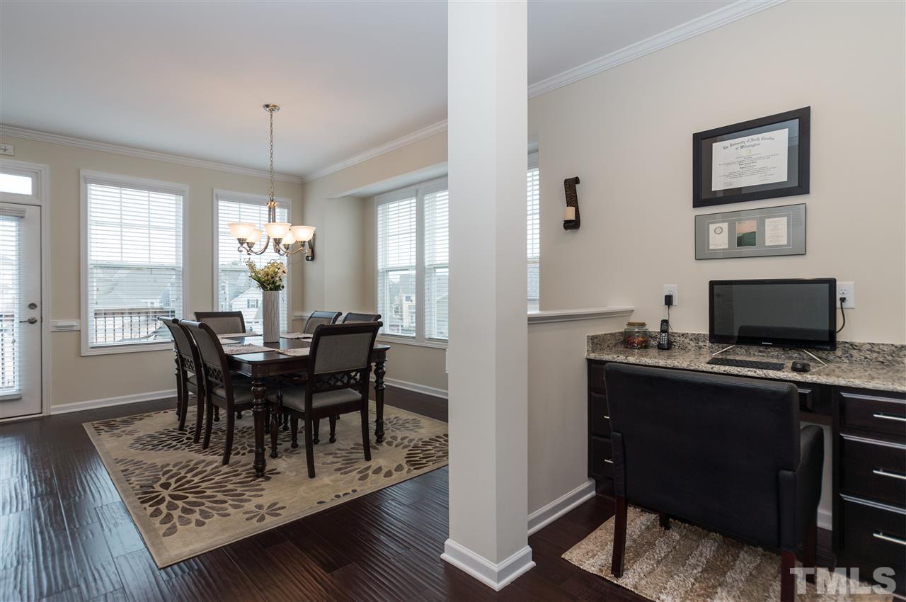 1345 Rodessa Run Raleigh, NC 27607 - Photo 8 of 24 a view of a dining room with furniture and window