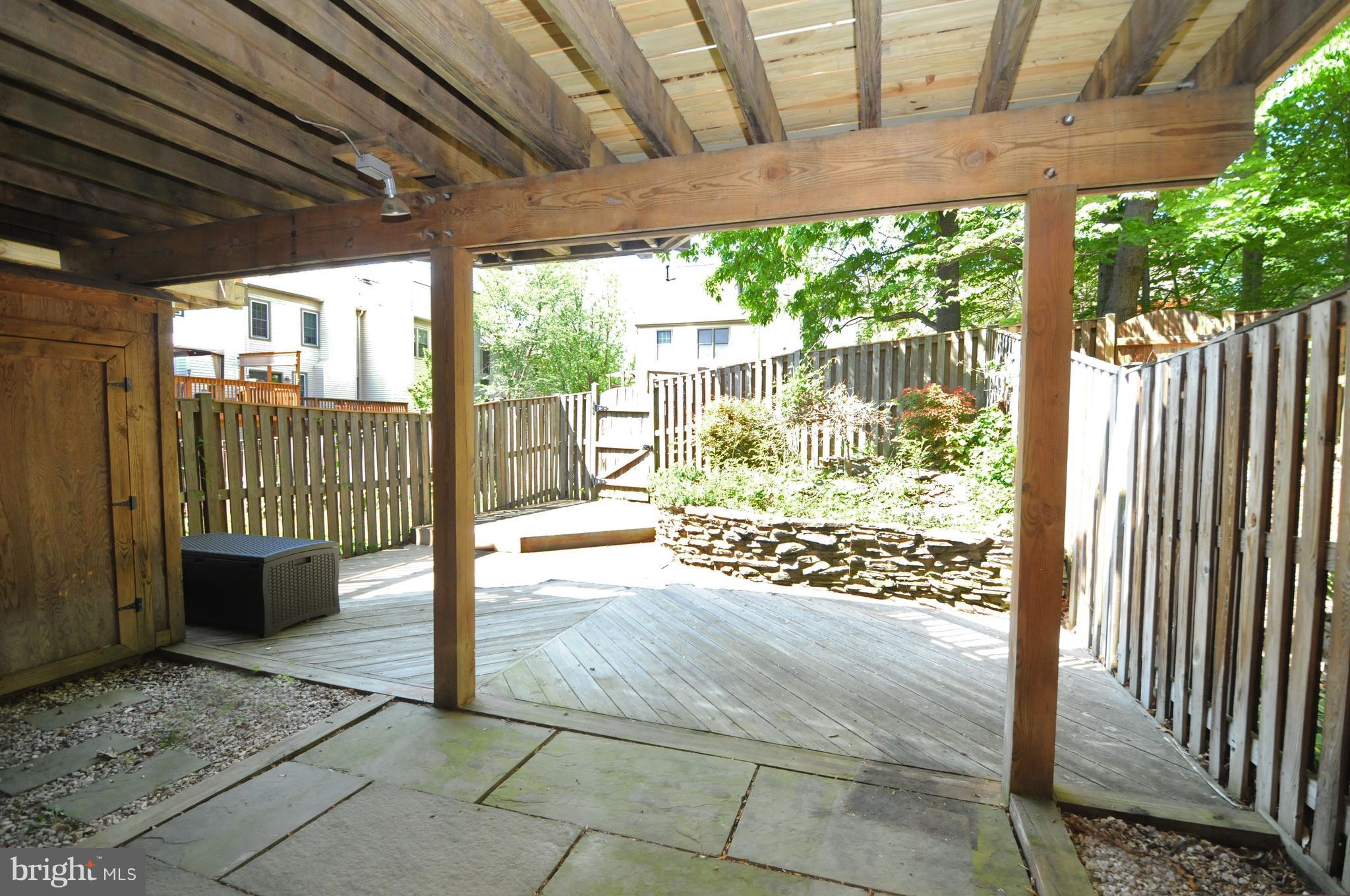 6364 English Ivy Way Springfield, VA 22152 - Photo 26 of 30 COVERED FLAGSTONE PATIO OUT TO LOWER DECK