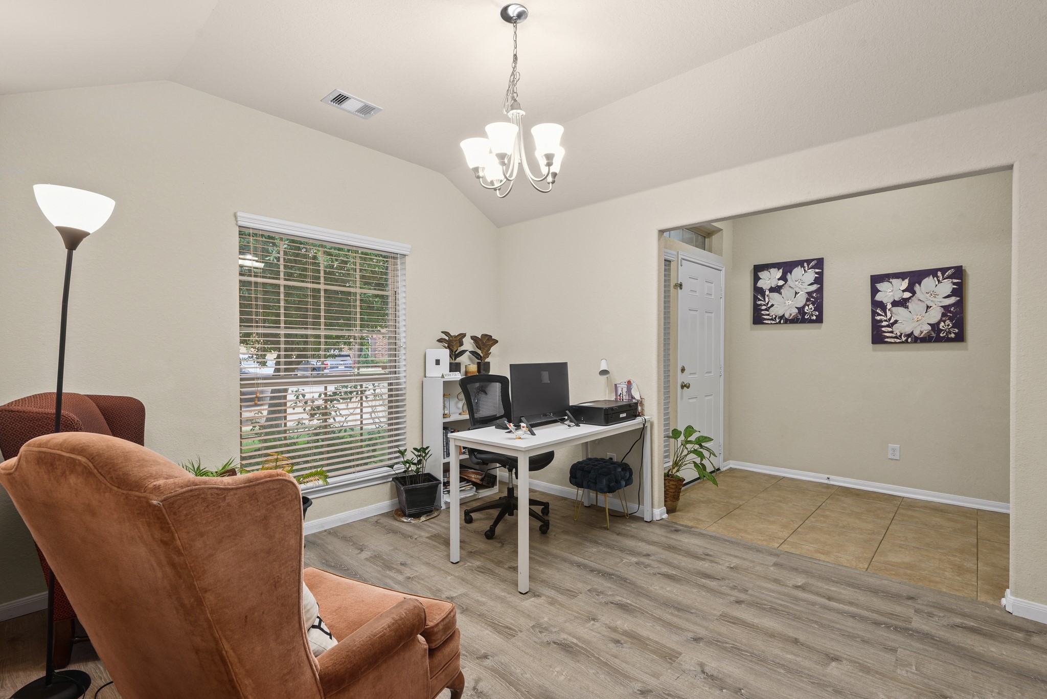 5211 Cayenne Lane Baytown, TX 77521 - Photo 3 of 19 This front room, currently being used as a home office, provides flex space for a formal dining or even a kids' play space.