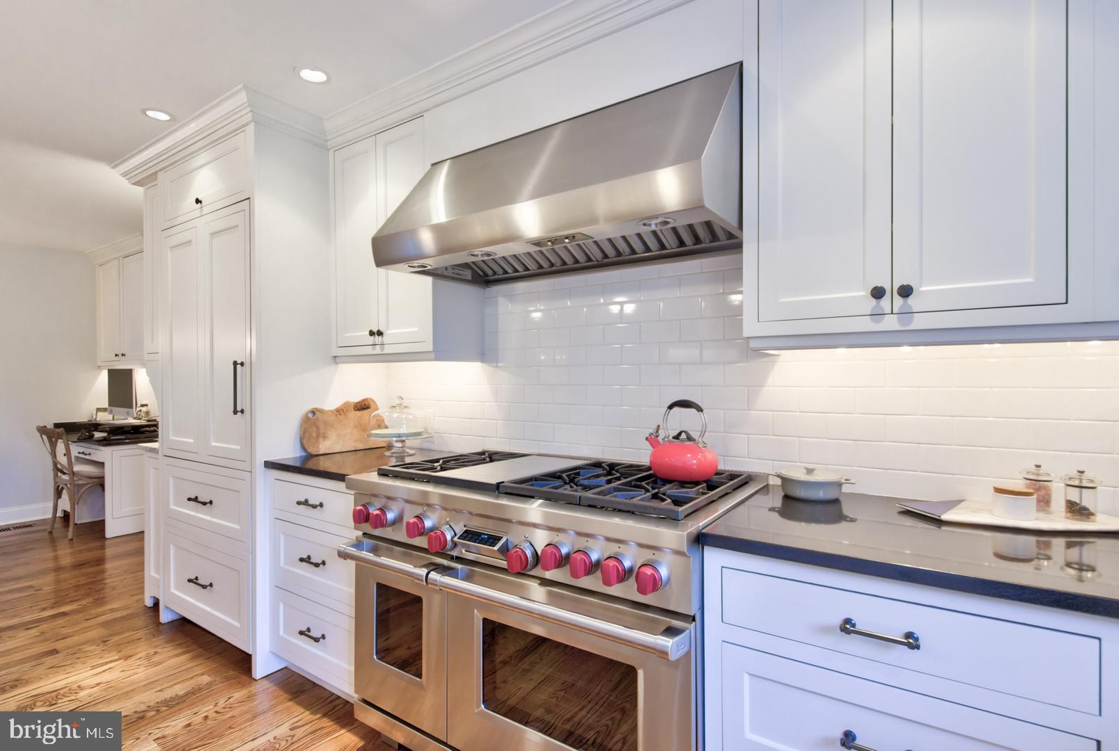 228 South Fairfield Road Devon, PA 19333 - Photo 27 of 61 a kitchen with stainless steel appliances granite countertop a stove and a sink