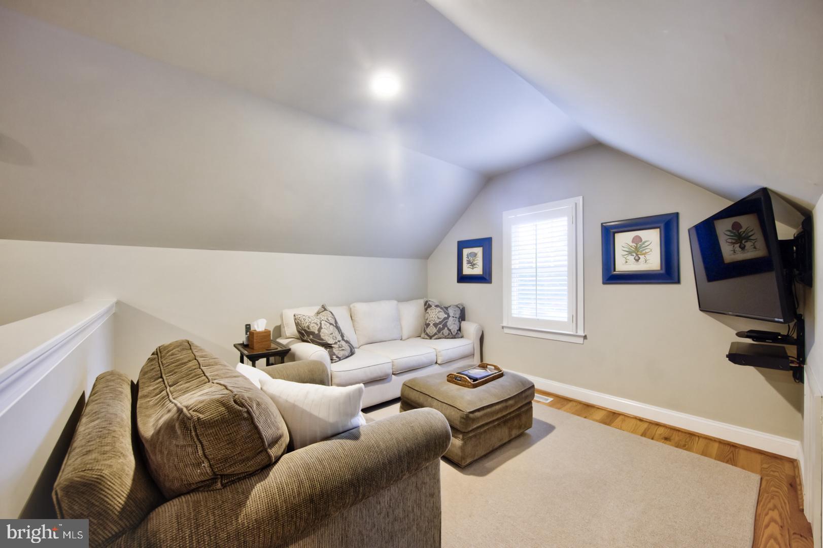 228 South Fairfield Road Devon, PA 19333 - Photo 33 of 61 a living room with furniture and a flat screen tv