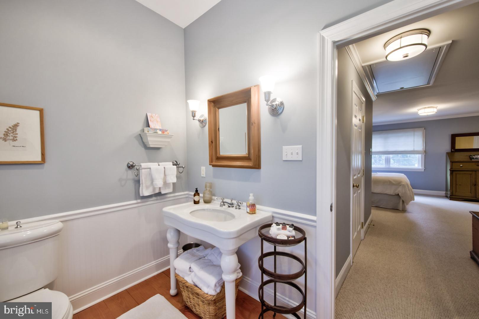 228 South Fairfield Road Devon, PA 19333 - Photo 39 of 61 a en suite bathroom with a toilet sink and mirror