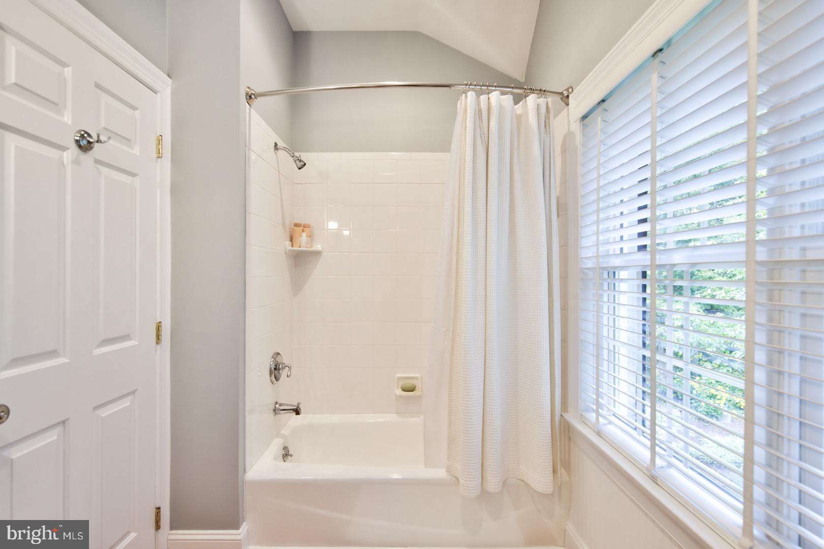 228 South Fairfield Road Devon, PA 19333 - Photo 40 of 61 a bathroom with a bathtub and a shower