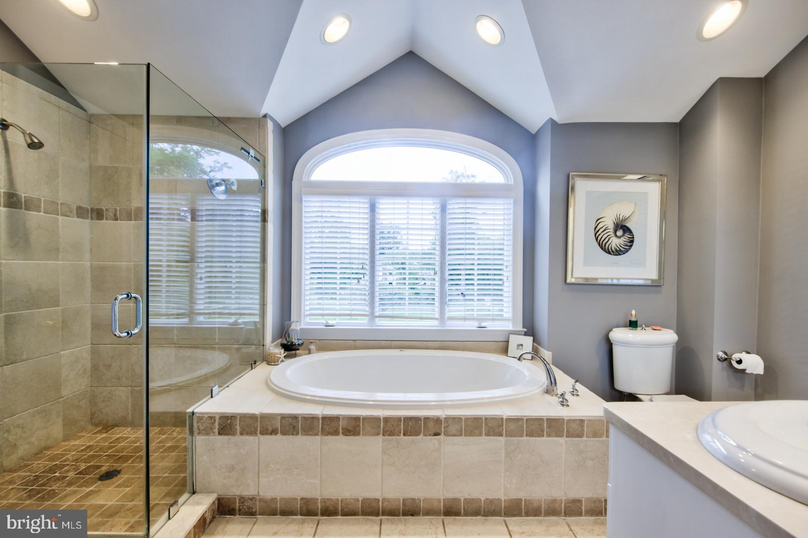 228 South Fairfield Road Devon, PA 19333 - Photo 51 of 61 a spacious bathroom with bathtub and window