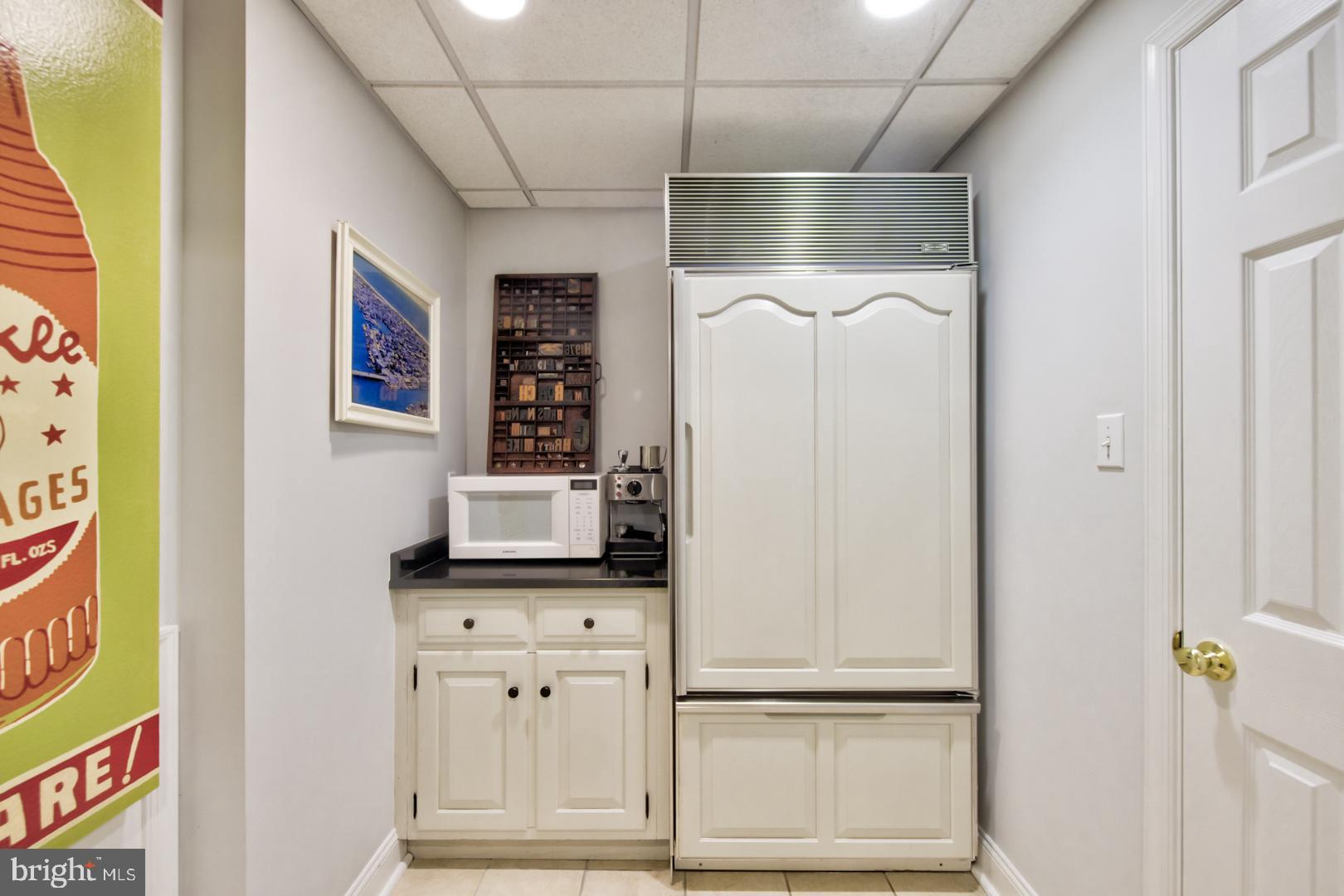 228 South Fairfield Road Devon, PA 19333 - Photo 59 of 61 a view of storage and utility room with racks on the wall