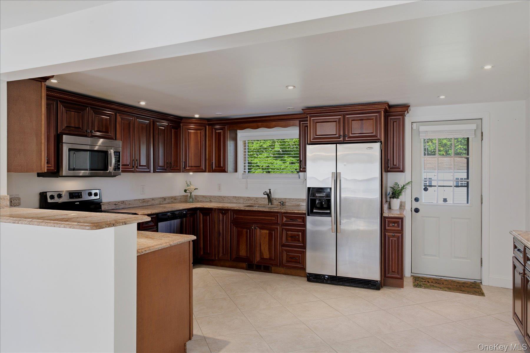 498 Miller Place Road Miller Place, NY 11764 - Photo 9 of 37 Large open concept Eat In Kitchen