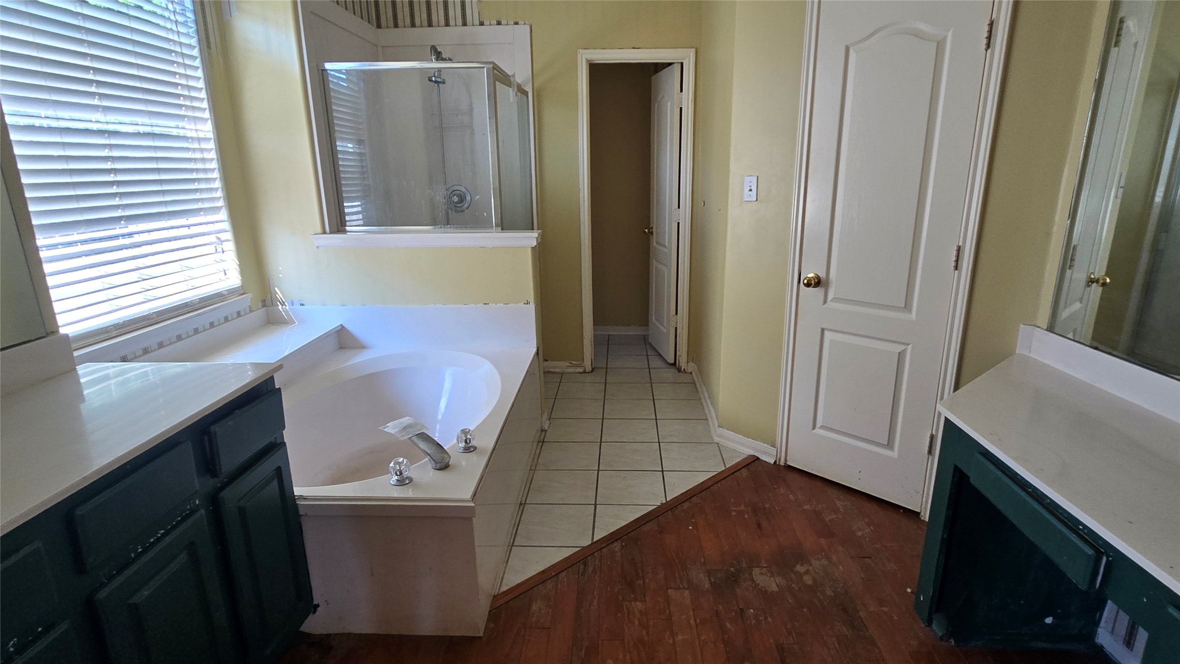 131 Annes Way Stafford, TX 77477 - Photo 13 of 25 a bathroom with a sink a mirror and a shower