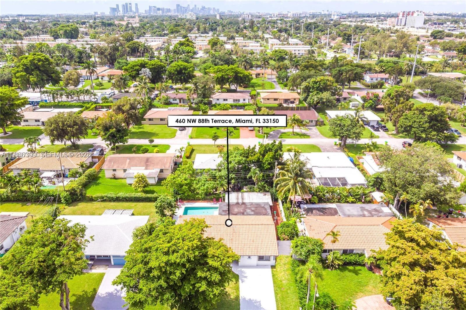 460 Northwest 88th Terrace El Portal, FL 33150 - Photo 2 of 20 an aerial view of residential houses with outdoor space and river