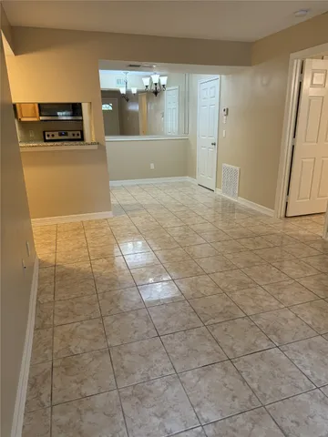 a view of kitchen and dining room