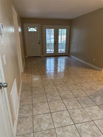 a view of entryway with stairs and a window