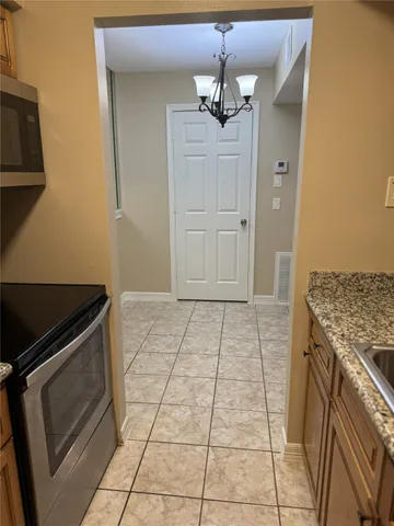 a view of a kitchen with a stove
