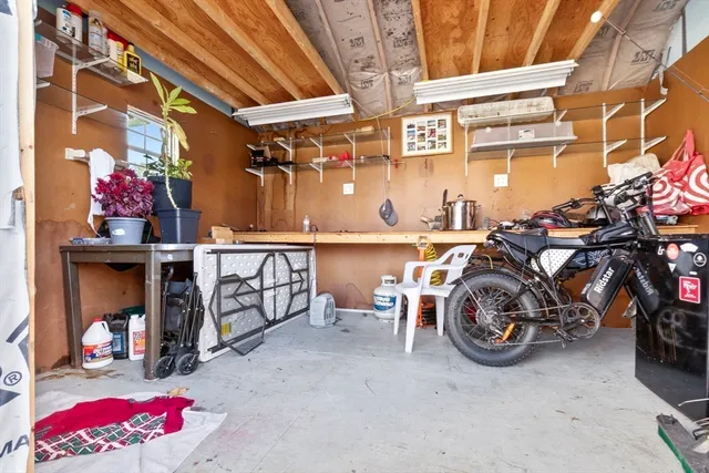 a view of a storage room with clothes