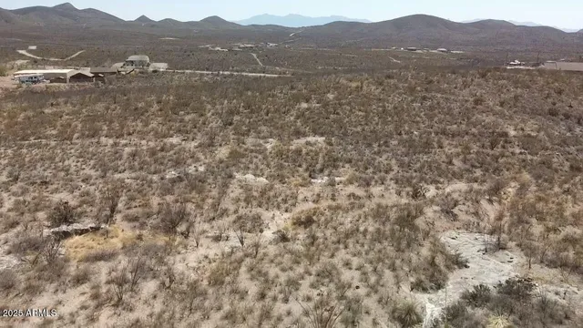 a view of an outdoor space with mountain view