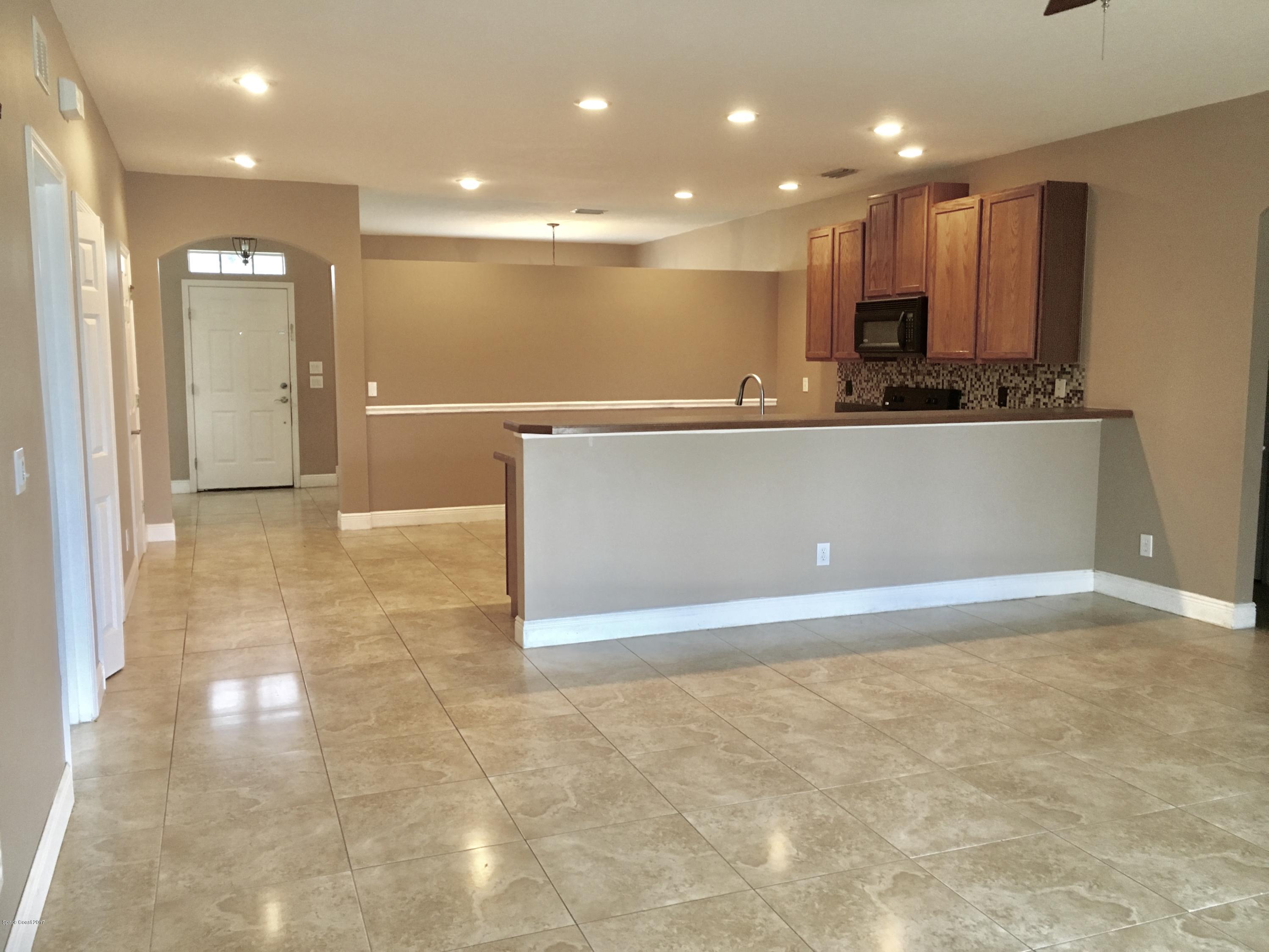 4010 Caparosa Circle Melbourne, FL 32940 - Photo 2 of 9 Huge Kitchen/Family Room