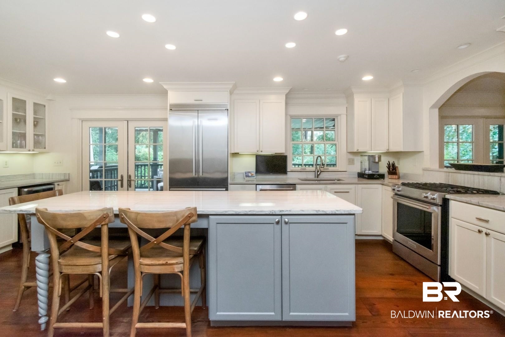 4810 Mums Court Mobile, AL 36608 - Photo 6 of 50 Kitchen with appliances with stainless steel finishes, a center island, recessed lighting, white cabinets, and ornamental molding