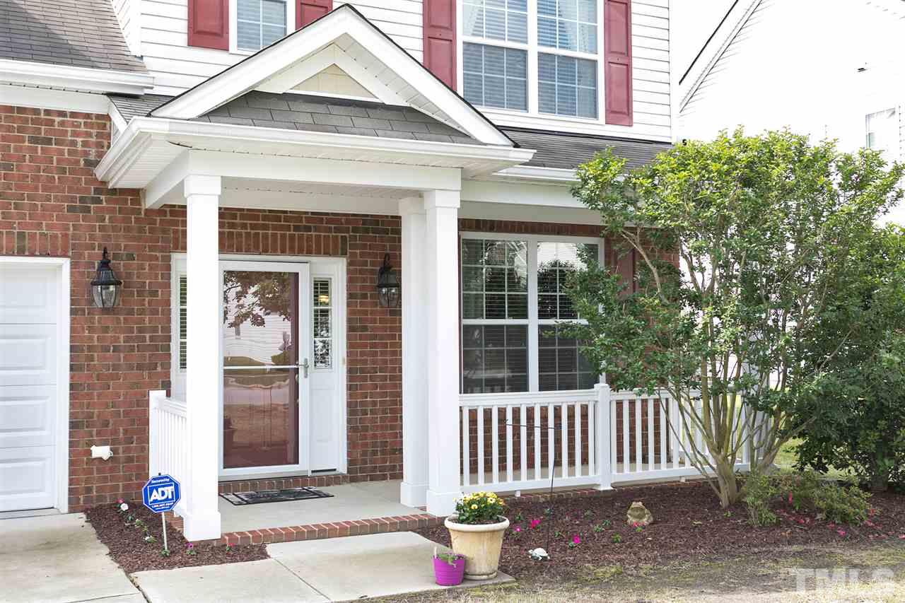 5136 Holly Ridge Farm Road Raleigh, NC 27616 - Photo 24 of 25 a front view of a house with a porch
