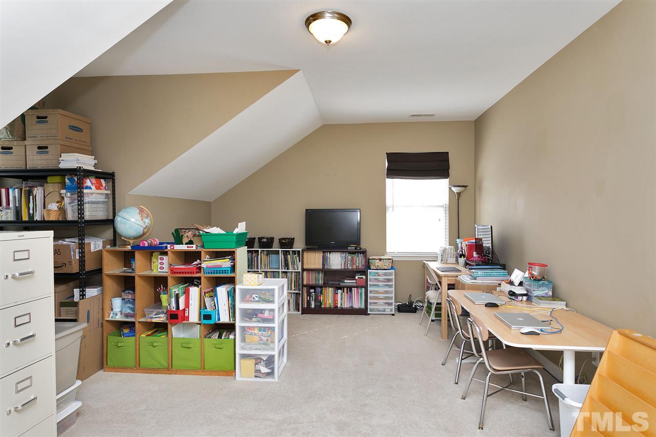 5136 Holly Ridge Farm Road Raleigh, NC 27616 - Photo 4 of 25 a room with furniture and a wooden floor
