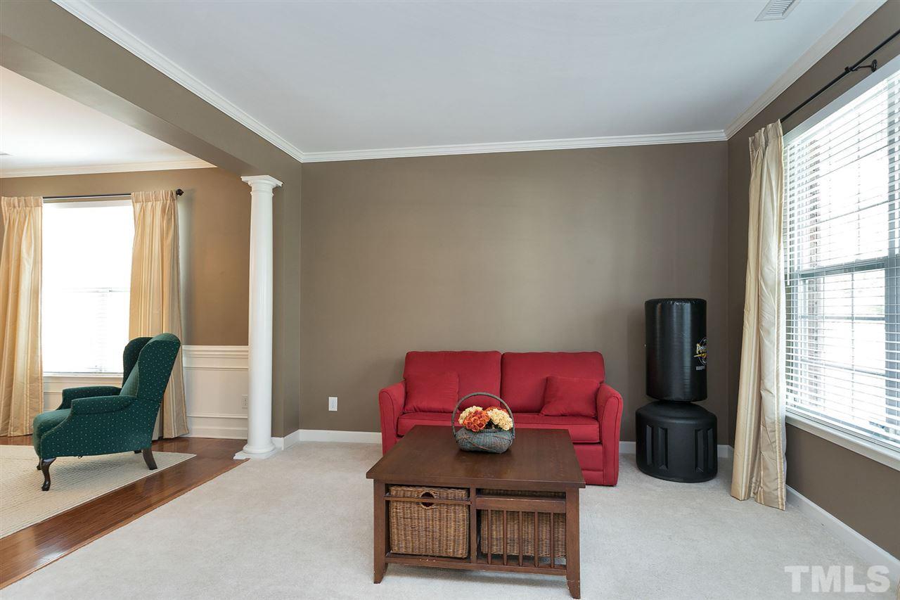 5136 Holly Ridge Farm Road Raleigh, NC 27616 - Photo 7 of 25 a living room with furniture