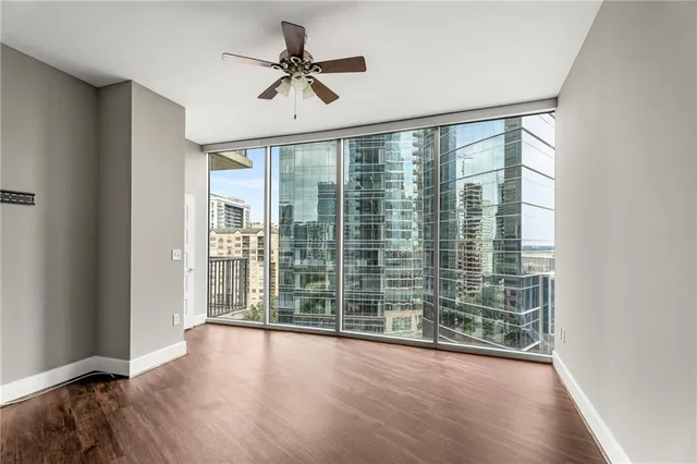 a view of an empty room with a window