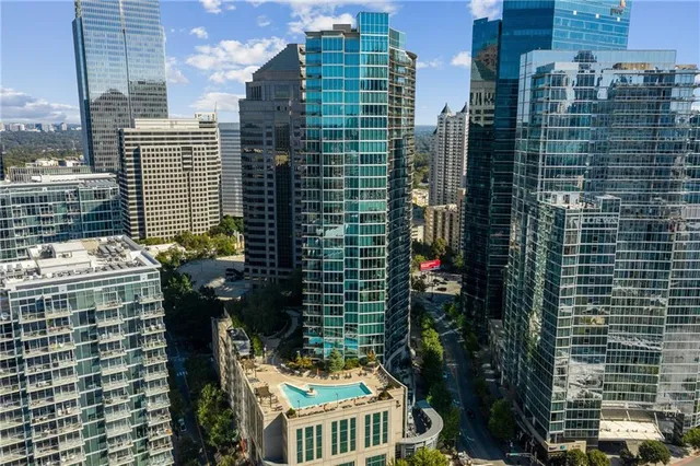 a view of a city with tall buildings