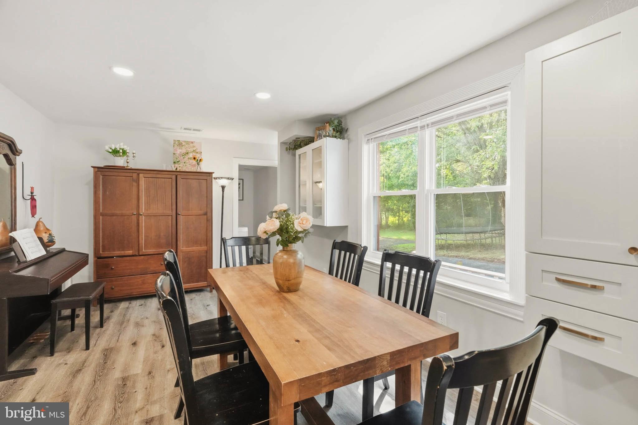 7948 Max Blobs Park Road Hanover, MD 21076 - Photo 12 of 42 Dining with Backyard Views