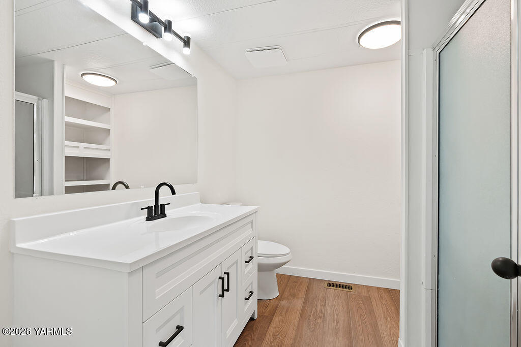 3701 Gun Club Road, Unit 45 Yakima, WA 98901 - Photo 13 of 20 a bathroom with a sink and a toilet