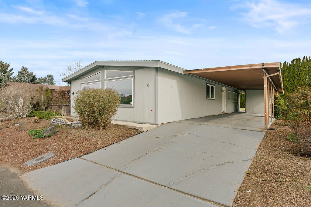 3701 Gun Club Road, Unit 45 Yakima, WA 98901 - Photo 4 of 20 a house with a outdoor space