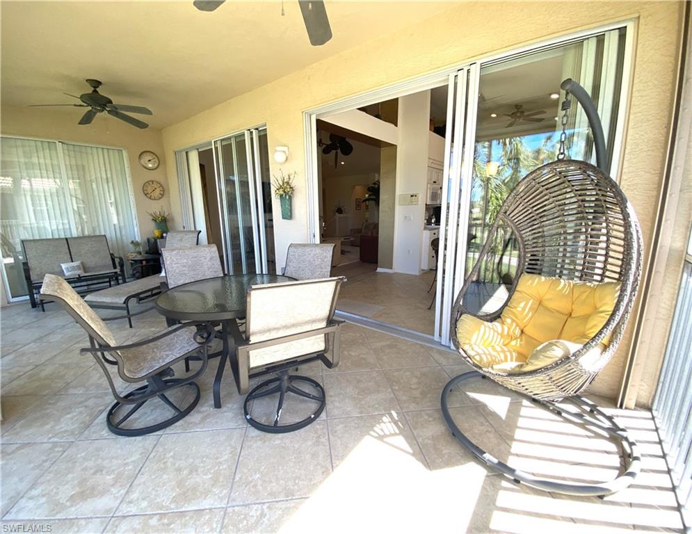 1570 Winding Oaks Way, Unit 201 Naples, FL 34109 - Photo 14 of 35 a living room with furniture