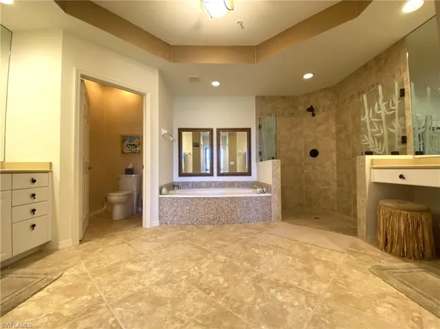 a large bathroom with a large tub
