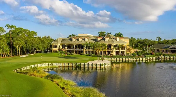 a view of a lake with a big yard