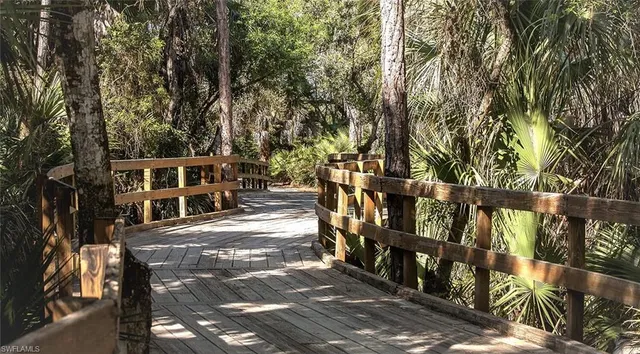 $8,400 | 1570 Winding Oaks Way, Unit 201, Naples, FL 34109