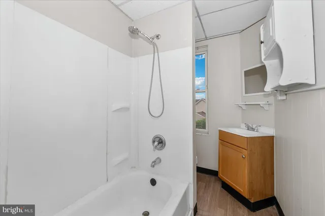 a bathroom with a sink and a vanity