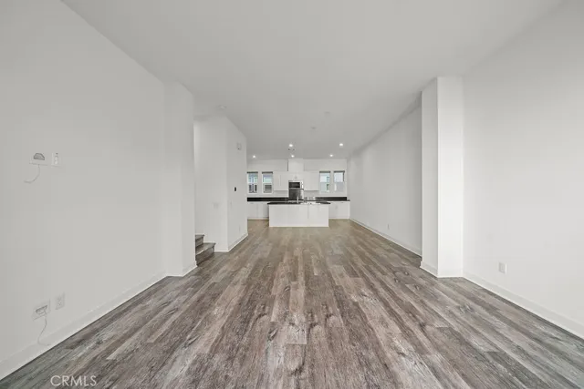 a view of kitchen with wooden floor
