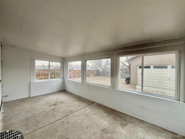 8950 Ithaca Way Westminster, CO 80031 - Photo 11 of 13 a view of an empty room with a window